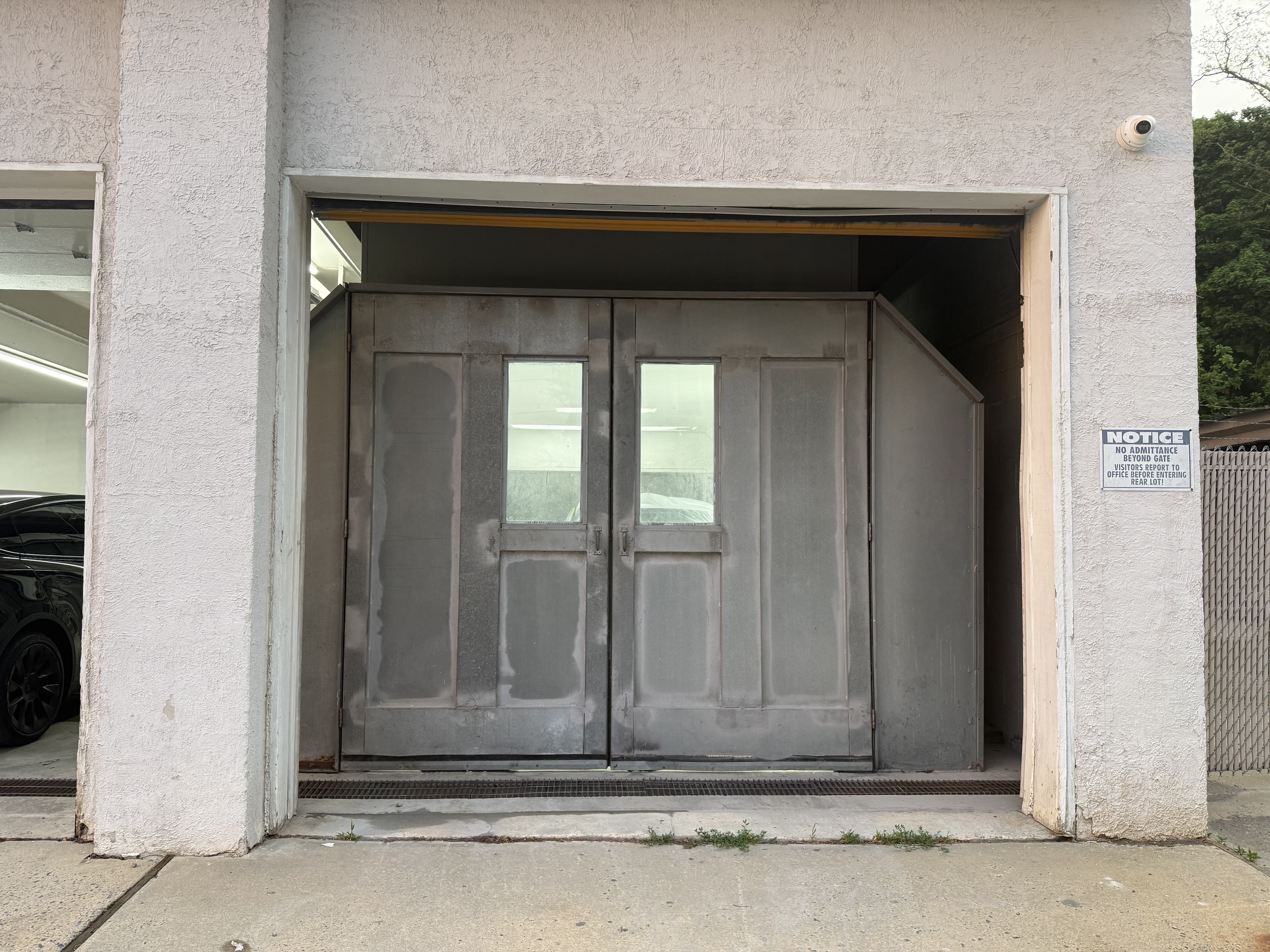 Professional paint booth double doors close-up