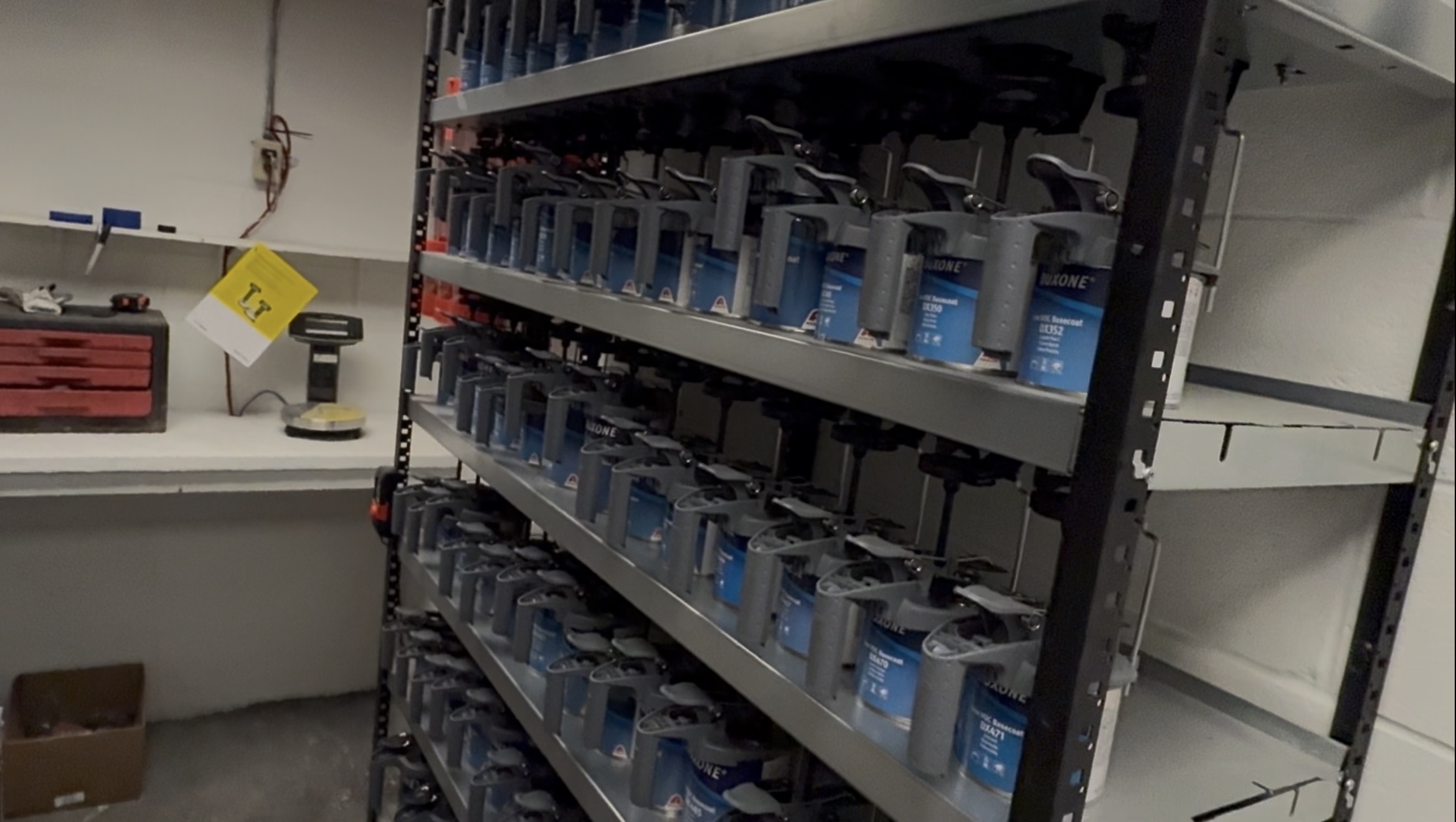Professional Duxone paint mixing station with supplies